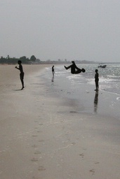 acrobats on the beach