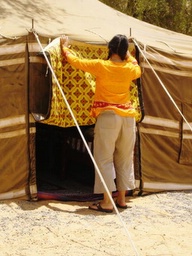 taeko opens the tent