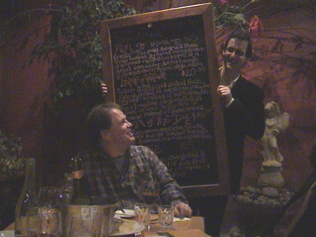 Adrian shows Berwin the menu